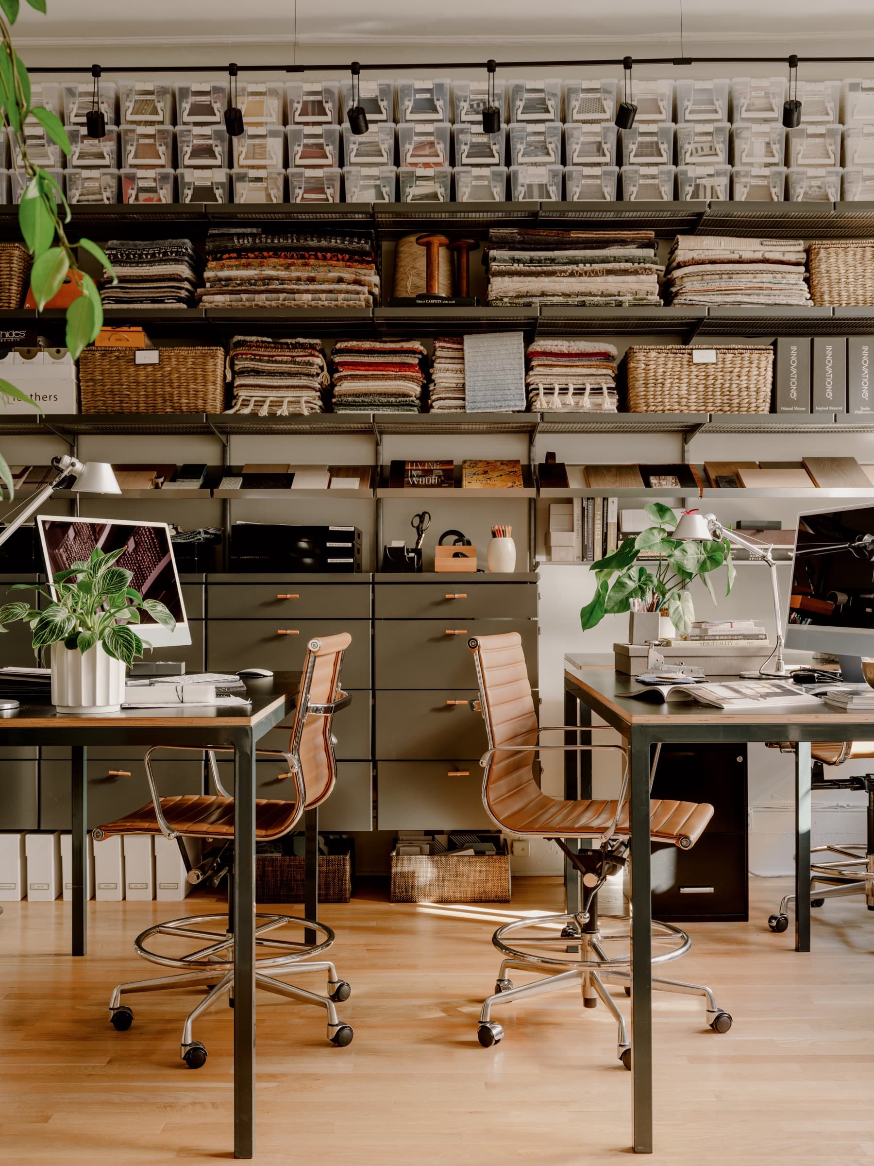 A reupholstered chair and studio library bring personality to the workplace.