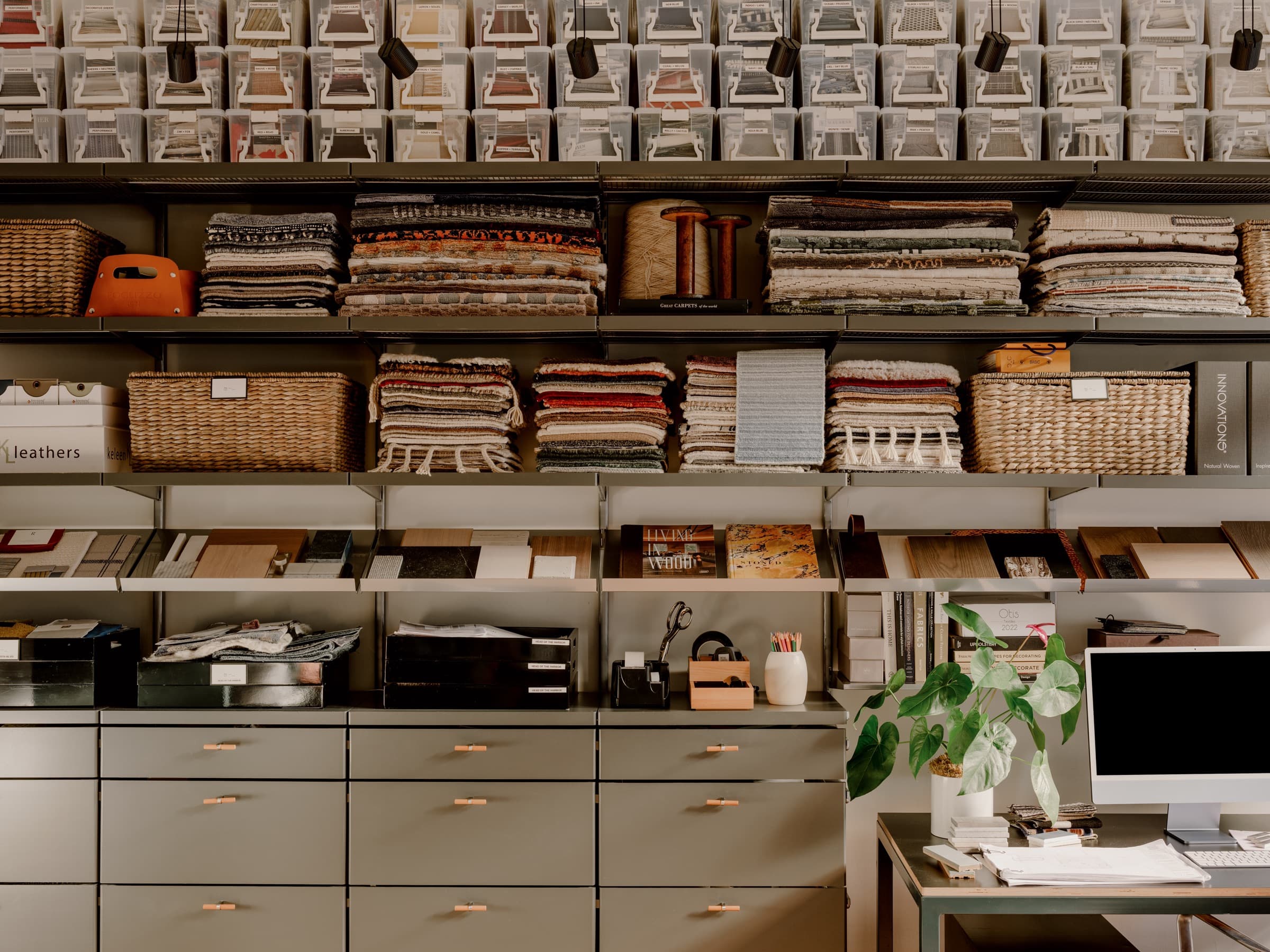 The studio pairs working storage with artful domesticity.
