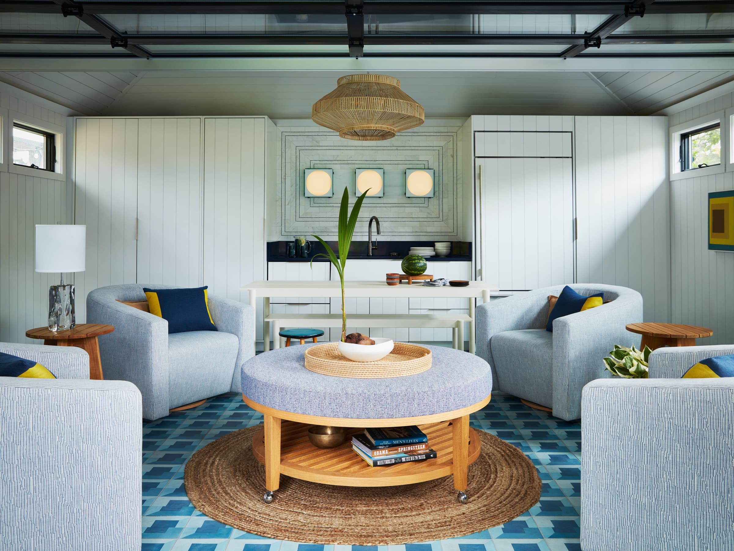 Performance materials and tailored furniture make the converted structure feel permanent.